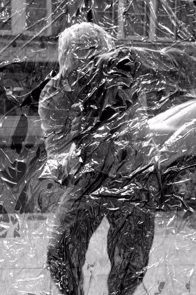 Harrop, his face hidden by reflections